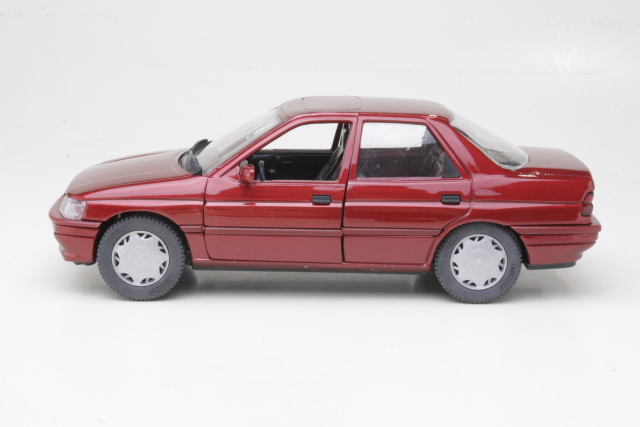 Ford Orion Mk3 1990, tummanpunainen - Sulje napsauttamalla kuva