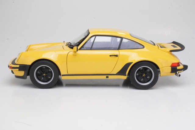 Porsche 911 Turbo 3.0 1976, keltainen - Sulje napsauttamalla kuva