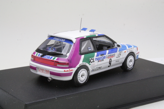 Mazda 323 GTX 4WD, RAC 1991, T.Mäkinen, no.9 "B-LAATU" - Sulje napsauttamalla kuva