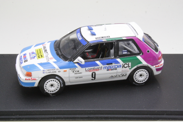 Mazda 323 GTX 4WD, RAC 1991, T.Mäkinen, no.9 "B-LAATU" - Sulje napsauttamalla kuva