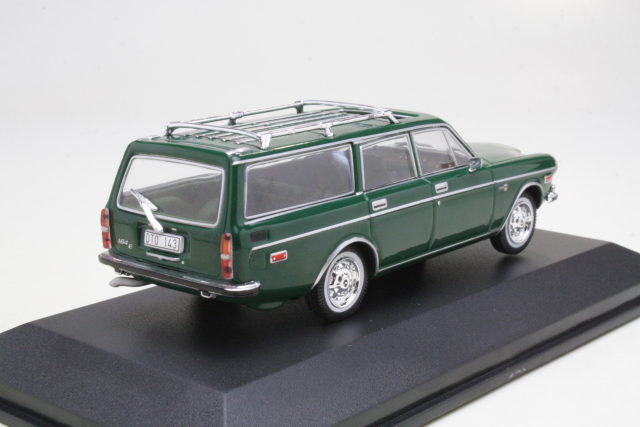 Volvo 165 1983, dark green (with driver figure)