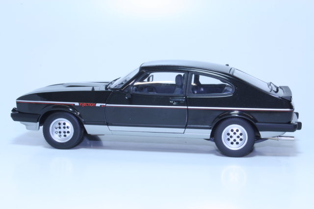 Ford Capri Mk3 2.8 Injection 1983, musta/hopea - Sulje napsauttamalla kuva