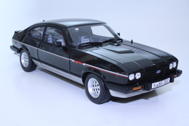 Ford Capri Mk3 2.8 Injection 1983, musta/hopea - Sulje napsauttamalla kuva