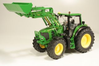 John Deere 7430 Premium 2006 with front loader, green