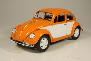 VW Beetle with the Fuchs wheels 1967, orange/white