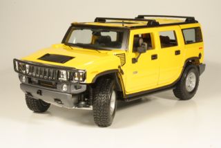 Hummer H2 2003 SUV, yellow