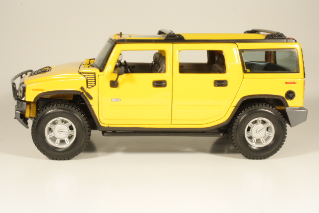 Hummer H2 2003 SUV, keltainen