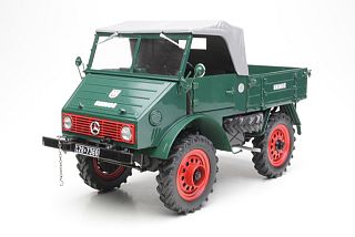 MB Unimog 401, tummanvihreä - Sulje napsauttamalla kuva